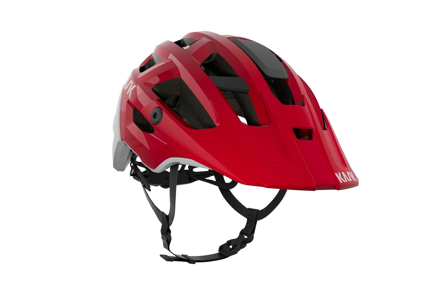 Casco MTB Kask Rex rosso con dettagli bianchi e visiera, visto di tre quarti su fondo bianco